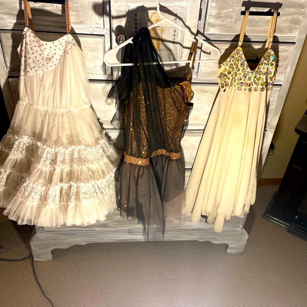 Dance dress costumes that I’ve been keeping for lack of need ,to them find homes